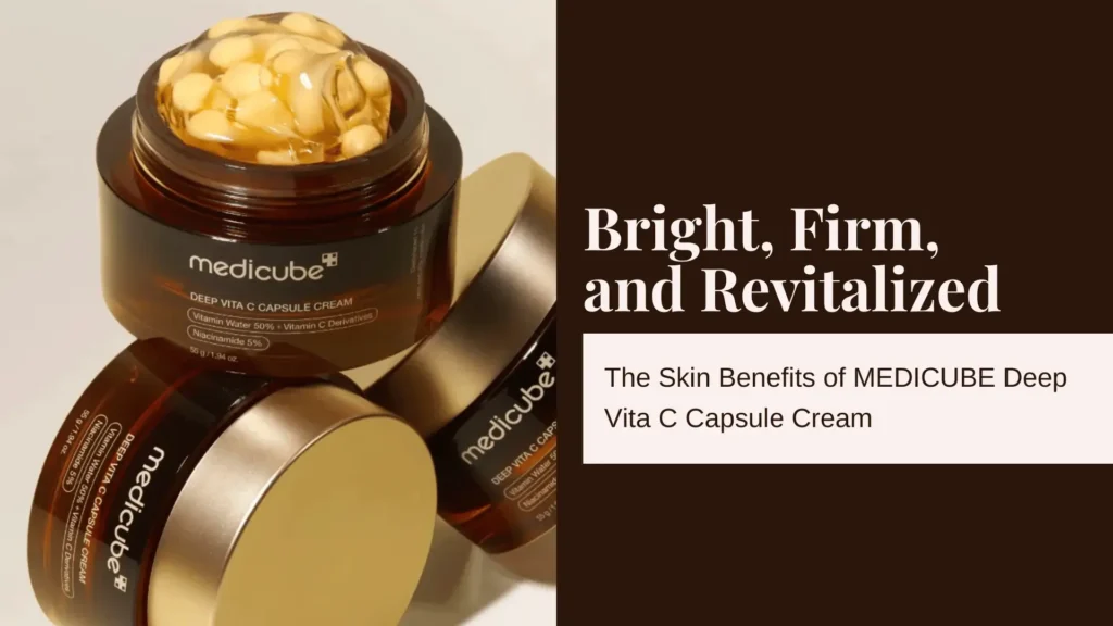 Promotional blog banner highlighting the skin-enhancing benefits of MEDICUBE Deep Vita C Capsule Cream. The left side features a close-up of the product in focus—a luxurious amber jar with a gold lid, opened to reveal pearl-like vitamin C capsules suspended in a glossy cream. The label on the jar clearly reads: "MEDICUBE Deep Vita C Capsule Cream" with key ingredients listed underneath: "Vitamin Water 50%, Vitamin C Derivatives, Niacinamide 5%." Two additional jars are creatively arranged at the base, showcasing the premium packaging from different angles. On the right side of the banner, a deep chocolate-brown background with white and beige text reads: “Bright, Firm, and Revitalized – The Skin Benefits of MEDICUBE Deep Vita C Capsule Cream.” The overall tone conveys high-performance skincare, vitamin-infused rejuvenation, and premium formulation for brightness, firmness, and anti-aging effects. Perfect for use in content focused on brightening serums, vitamin C skincare routines, K-beauty anti-aging treatments, and niacinamide-rich face creams. Keywords: “MEDICUBE capsule cream,” “vitamin C skincare,” “brightening face cream,” “niacinamide anti-aging,” “K-beauty glow product.”